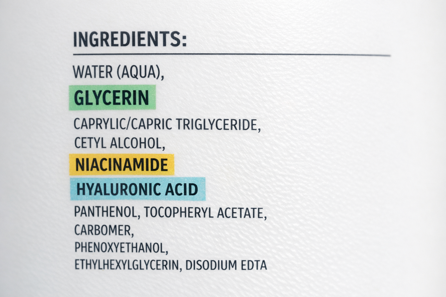 Close-up of a moisturizer ingredients label with key humectants and niacinamide highlighted