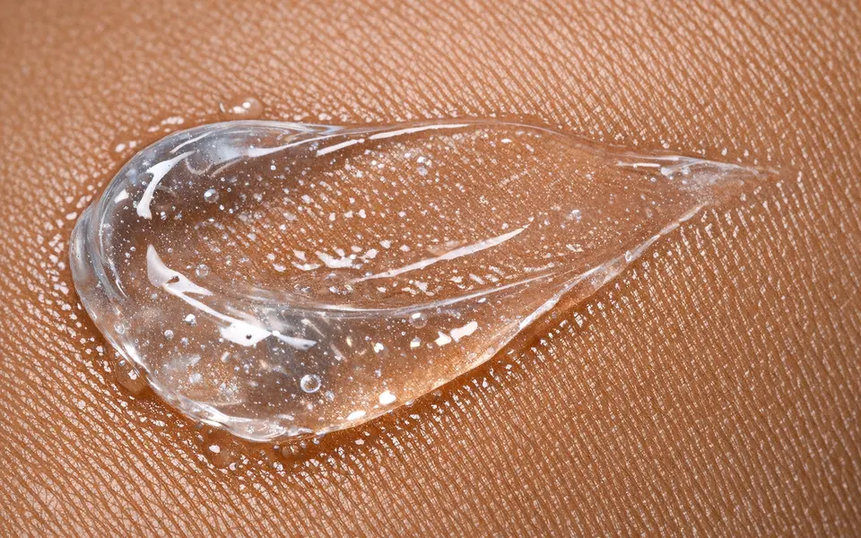 Close-up of a translucent night gel texture on brown Indian skin